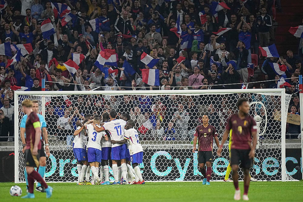 | Photo: AP/Laurent Cipriani : 2024–25 UEFA Nations League, France vs Belgium: French players celebrate the opening goal 